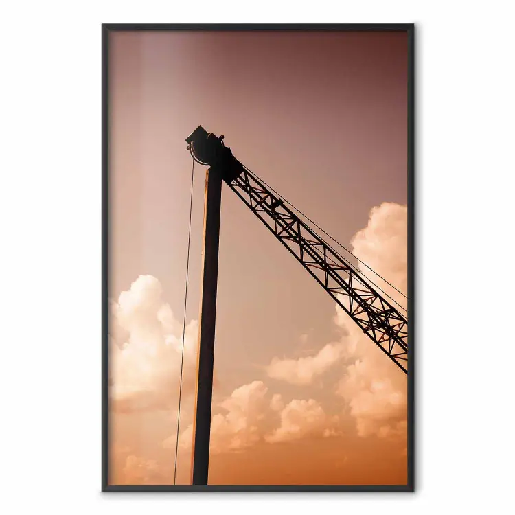 Wolkenformation - Landschaft mit orangefarbenem Himmel und Baukran