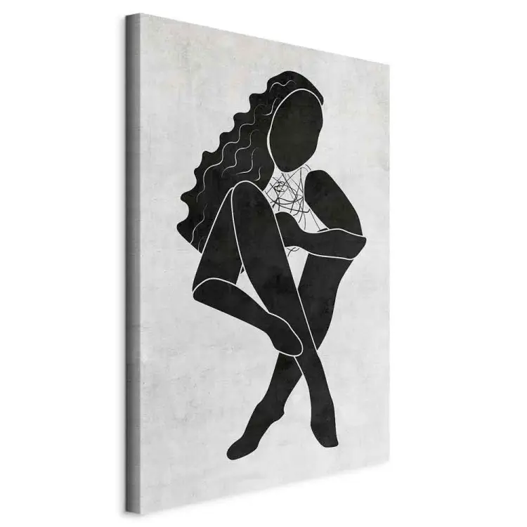Sitzende Figur einer Frau - schwarz-weiße Silhouette einer Frau