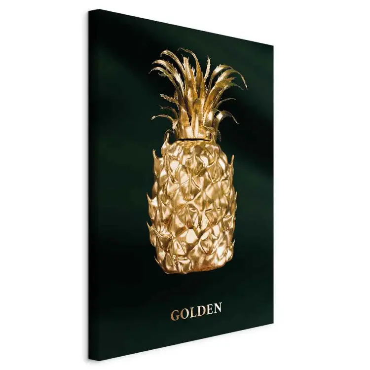 Ananas aus Gold - Frucht mit Inschrift auf dunkelgrünem Hintergrund