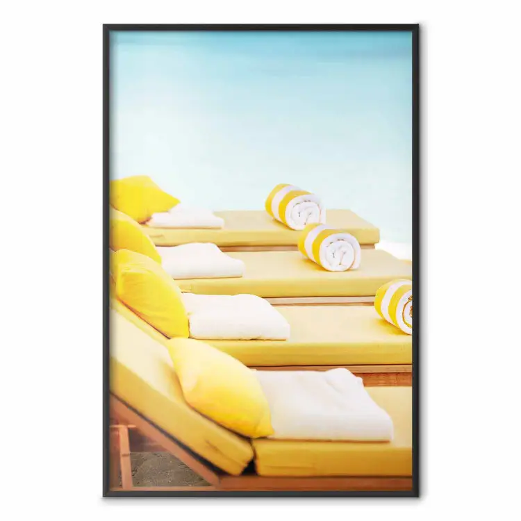 Summer at the Seaside - Yellow Sun Loungers on the Beach Lit by the Holiday Sun