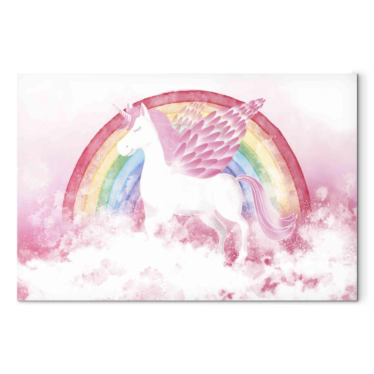 Leinwandbild Pink Power - A Unicorn With Wings and a Rainbow on a Background of Clouds