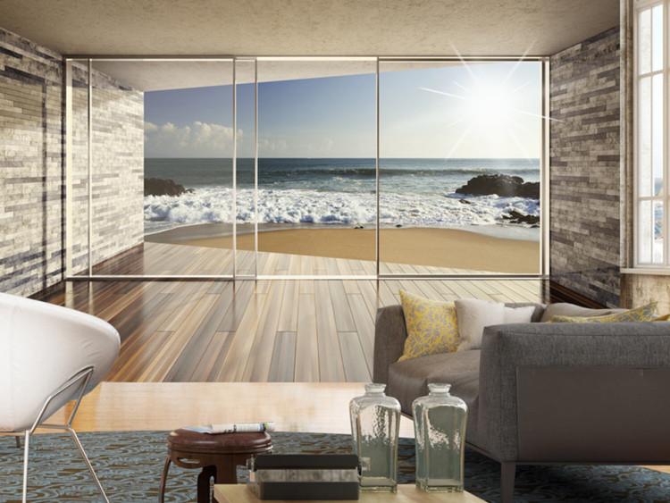 Fototapete Fenster mit Aussicht - sandiger Strand mit Felsen und Sonne am Himmel