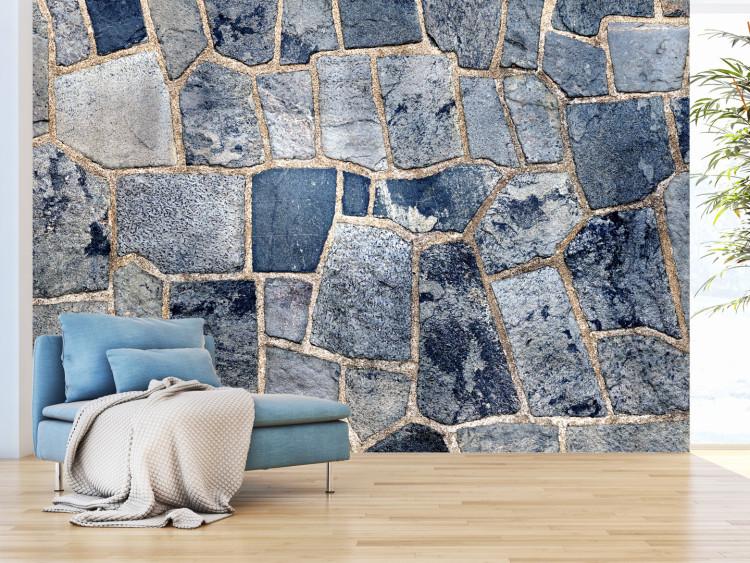 Fototapete Blaue Elemente - Hintergrund mit unregelmäßiger Textur von Steinen